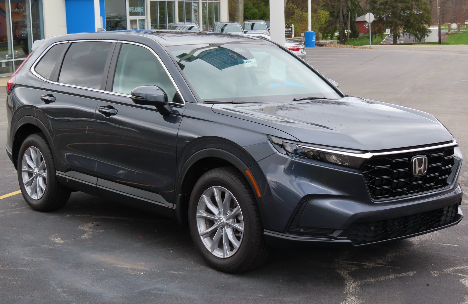 2023 Honda CR-V EX-L in gray, front three-quarter view